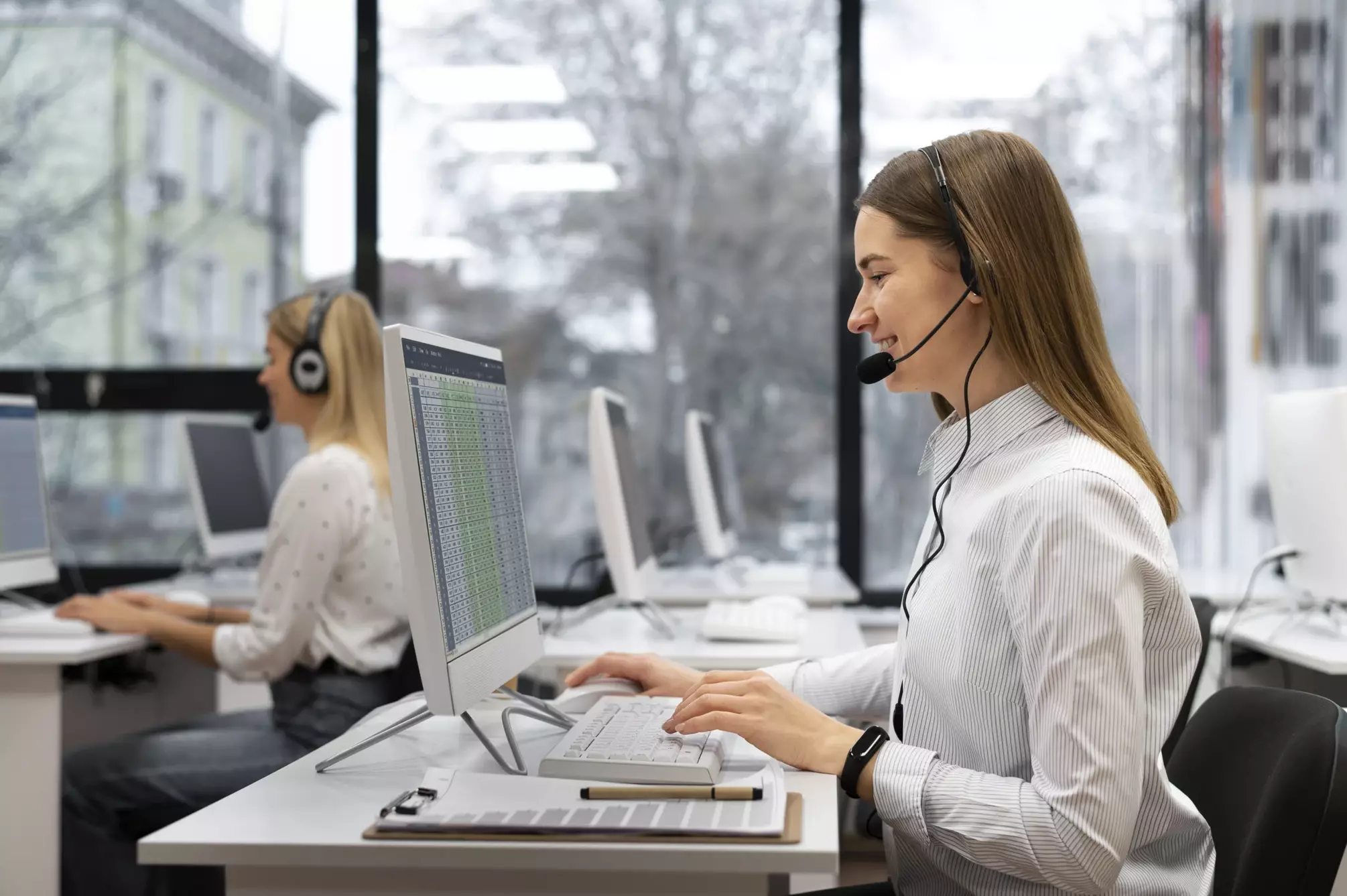 Customer support team ready to assist over the phone, symbolizing reliable and accessible service with headset icon and call center background.